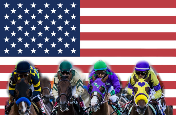Four racehorses with jockeys in colorful silks competing against an American flag background.