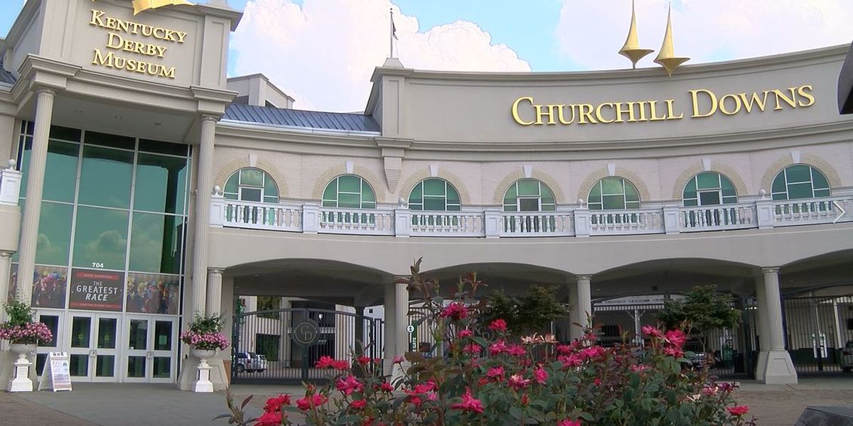 Entrance of Churchill Downs featuring the Kentucky Derby Museum and decorative architecture.
