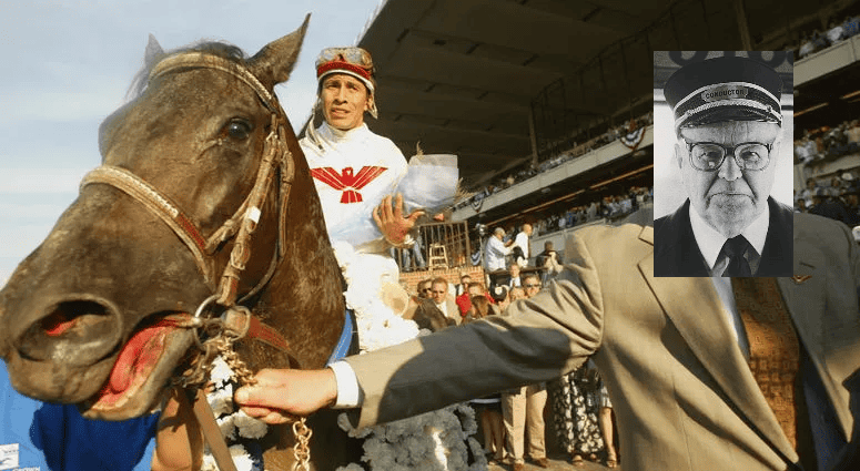 Jockey celebrating victory on a horse at a racetrack, showcasing the excitement of horse racing and sportsmanship.